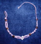 Natural and purple hemp with wooden beads and sliced shell center-piece (1) (Will get a better picture of this soon)